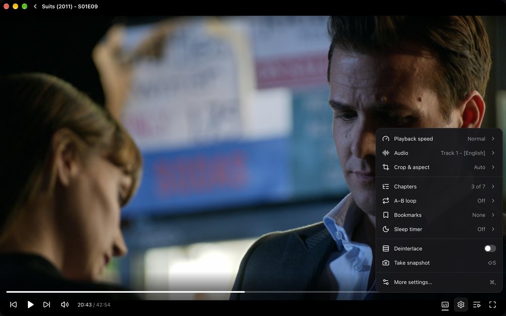 The player menu open over a paused episode, listing playback speed, audio, crop and aspect, chapters, A–B loop, bookmarks, sleep timer, deinterlace and snapshot