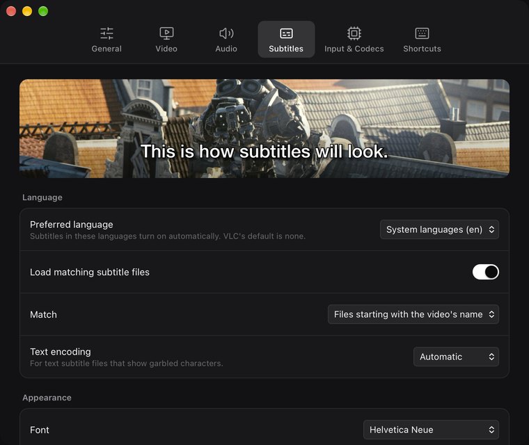 ReVLC's Settings window on the Subtitles tab, with a live subtitle preview and language options